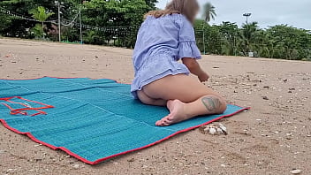 bottomless girl on the beach