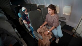 While the others are napping she orgasms on the plane