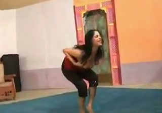 Raven haired Indian wife does her yoga exercises tight yoga pants