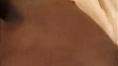 Nerdy ebony chick with glasses uses a vibrator before being dicked down