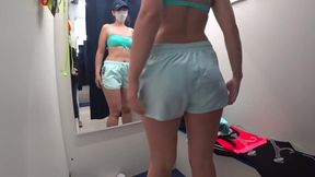 Mature milf and her young daughter in a public fitting room. Different swimsuits and mini bikinis on sexy big ass.