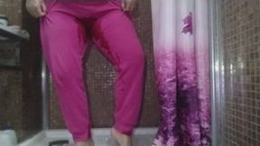 Pee wearing trousers