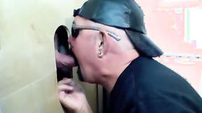 ”A glory hole fan has brought his friend to share one mouth”