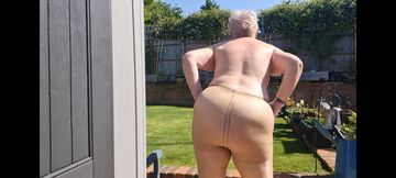 Naked pantyhose dancing in the garden