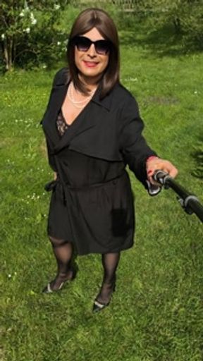 In black lingerie in the garden