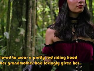 Little Red Riding Hood walking alone in the forest