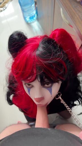 Clown with red hair and claws
