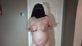 Dancing naked in Niqab and Boots