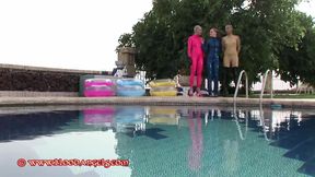 Latex Girls Play in Swimming Pool