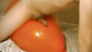 Big inflatable orange balloon humping cum