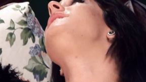 A sexy dark haired babe pleasing a loaded cock with her moves