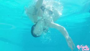 petite teen nude in the swimming pool