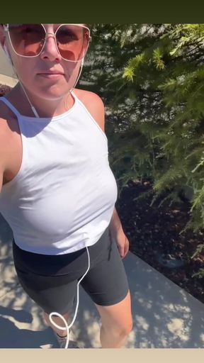 Busty redhead MILF flaunts her natural big tits