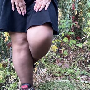 MILF in dress and torn pantyhose pissing outdoors