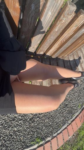 Sexy hot stepmom is horny and caresses herself on a park bench
