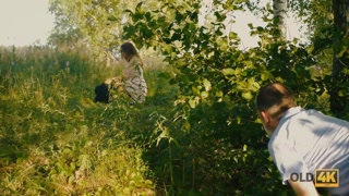 OLD4K. Girl tempts old man and gets it on with him in the greenery