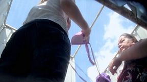Mature lady and young chick filmed in the beach cabin