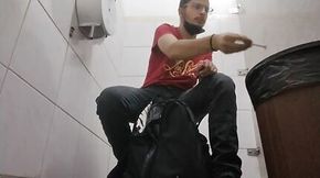 Smoking inside a public toilet