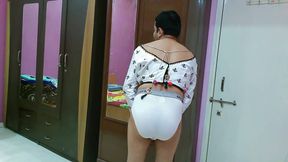 Hot crossdresser femboy Sweet Lollipop in a white crop top and thong.