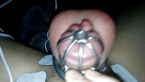 Pretty sissy Sadie caged e-stim orgasm