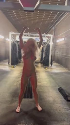 Hot Blonde gets dared to get naked in a moving car wash