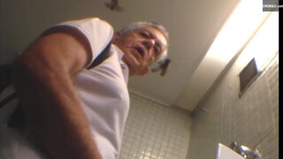 Voyeur films old males in the public restroom