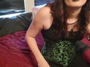 Trans girl in green corset close up cum shot