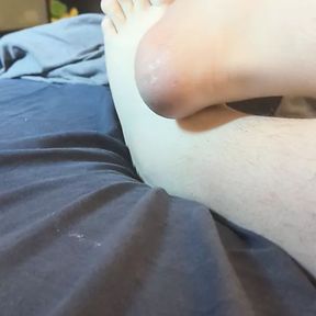 Rubbing Lotion on my Feet in Bed