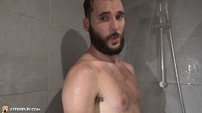 Sexy bearded french guy under shower