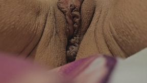 Milf playing with huge labia and rubbing her clit until orgasm