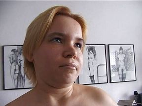 Chubby blonde gets naked at casting