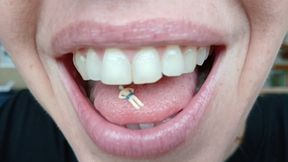 Lania finds a tiny soldier and shrinks him slowly so she can play with him inside her mouth