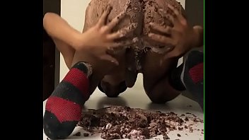 Hot black ass sitting on Raspberry Chocolate Cake