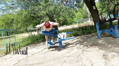 Risky workout in a public park: tiny skirt and no panties
