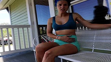 Sunshine Pisses spandex booty shorts outside