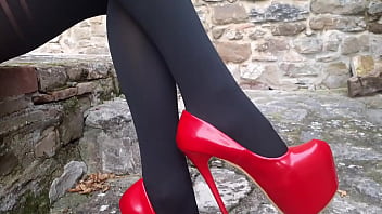 Laura XXX on high heels and stockings sitted and walking