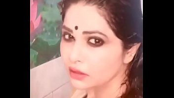 Taking shower in sari