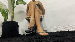 My flip-flops are dangling while my legs are crossed (5)