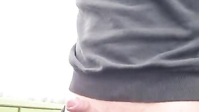 Young and horny guy shows his dick in public ends with unwanted precum orgasm. Risky walking around with pissing cock.