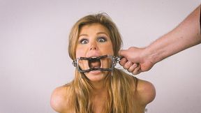 Candle Boxxx: Dental Gag Bondage Topless, Cuffed, and Tied