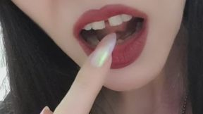 I lick my long, sharp claws with my long wet tongue and suck them for you