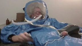 Enjoying being intubated on a ventilator session in a Hazmat Suit