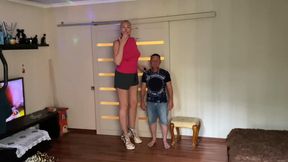 Tall and feet size contrast: Amazon Beatrix against a man