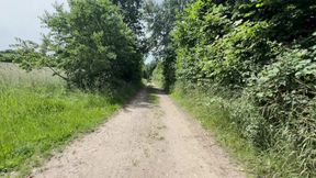 Boy naked on public dirt road
