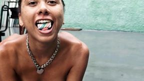 Submissive pet taken for a walk and fed snacks in the yard