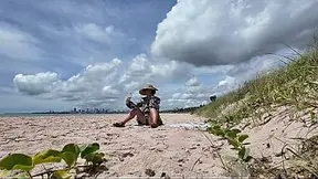 Thicc MILF exposes hairy snatch at public beach