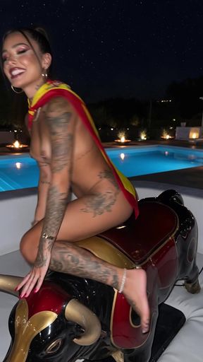 Tattooed woman on motorcycle