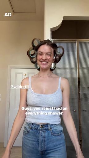 Woman with curlers in her hair