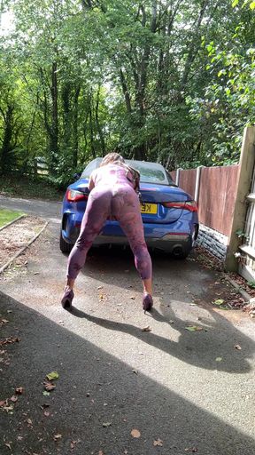 Sexy Crossdresser kellycd2022 in purple catsuit and heels outdoors