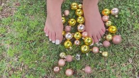 crushing Christmas baubles with your feet